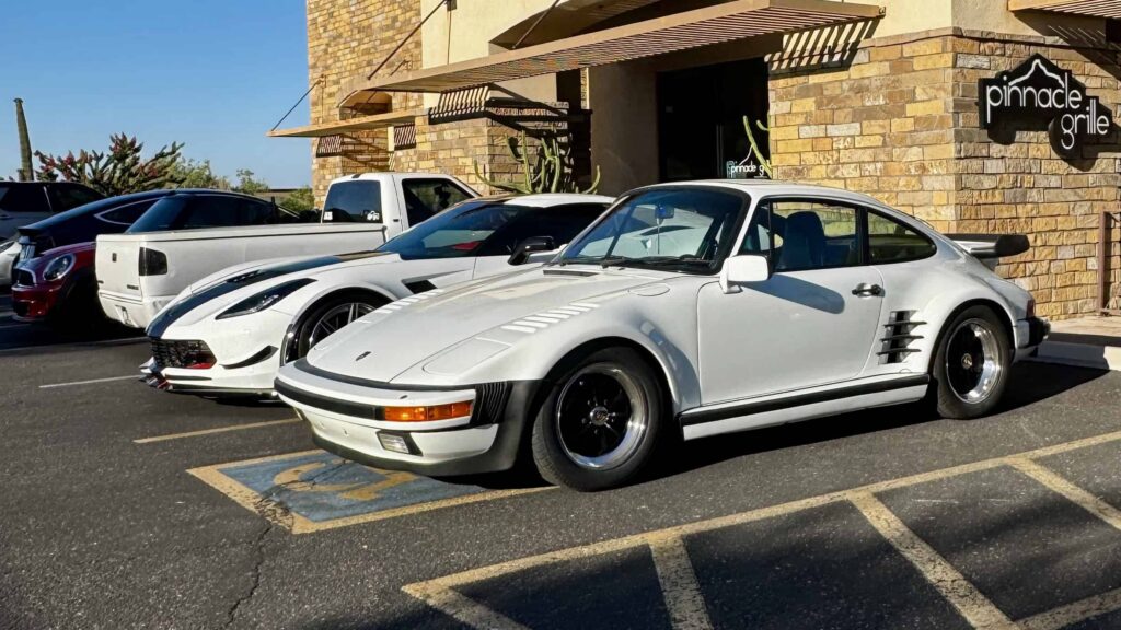 Porsche sports car on display at Alpio’s Cars and Coffee in North Scottsdale, parked among classic and exotic vehicles during the monthly car show.